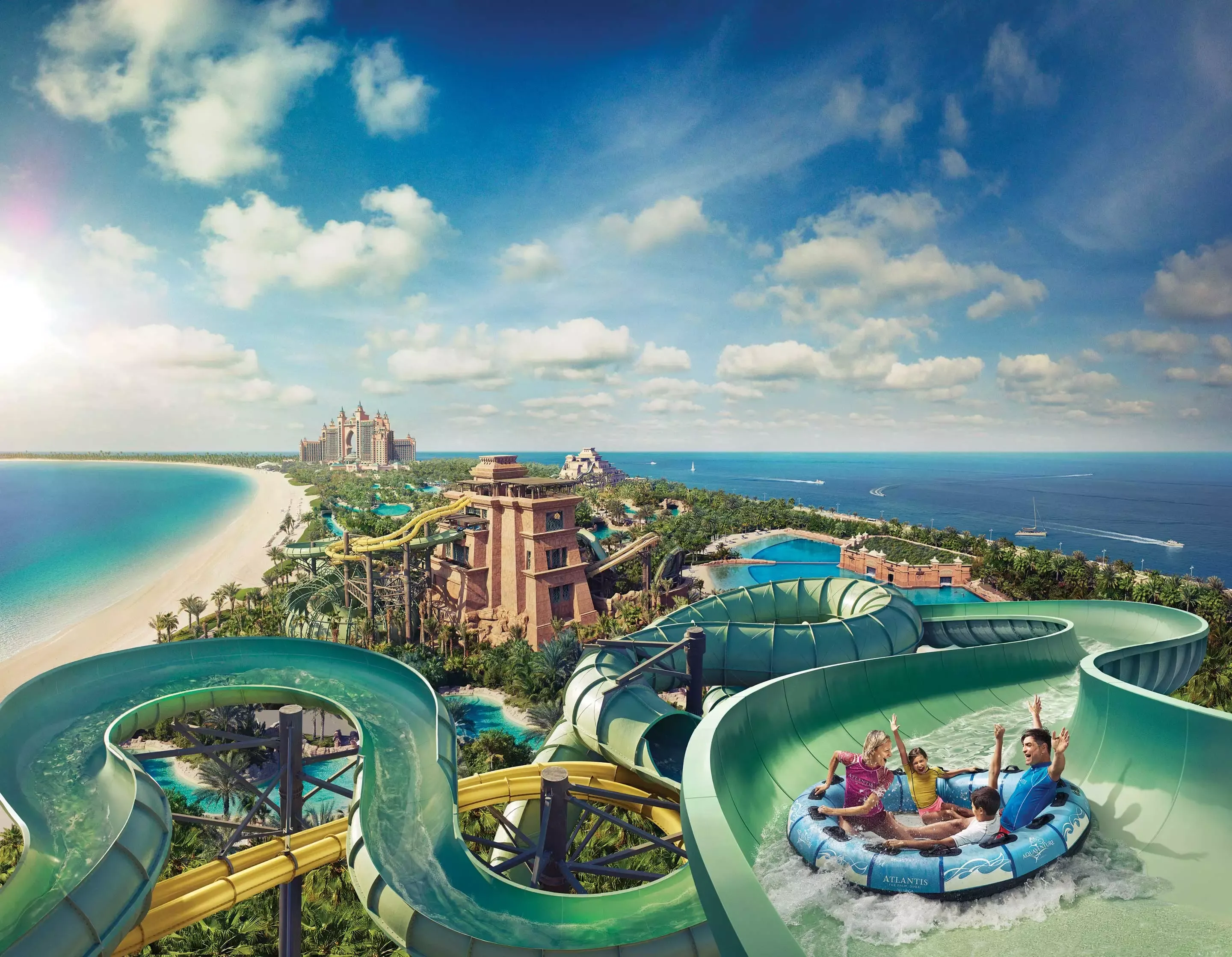 Aquaventure-Lifestyle-WaterparkHeroFamilyRideOverlookingResort