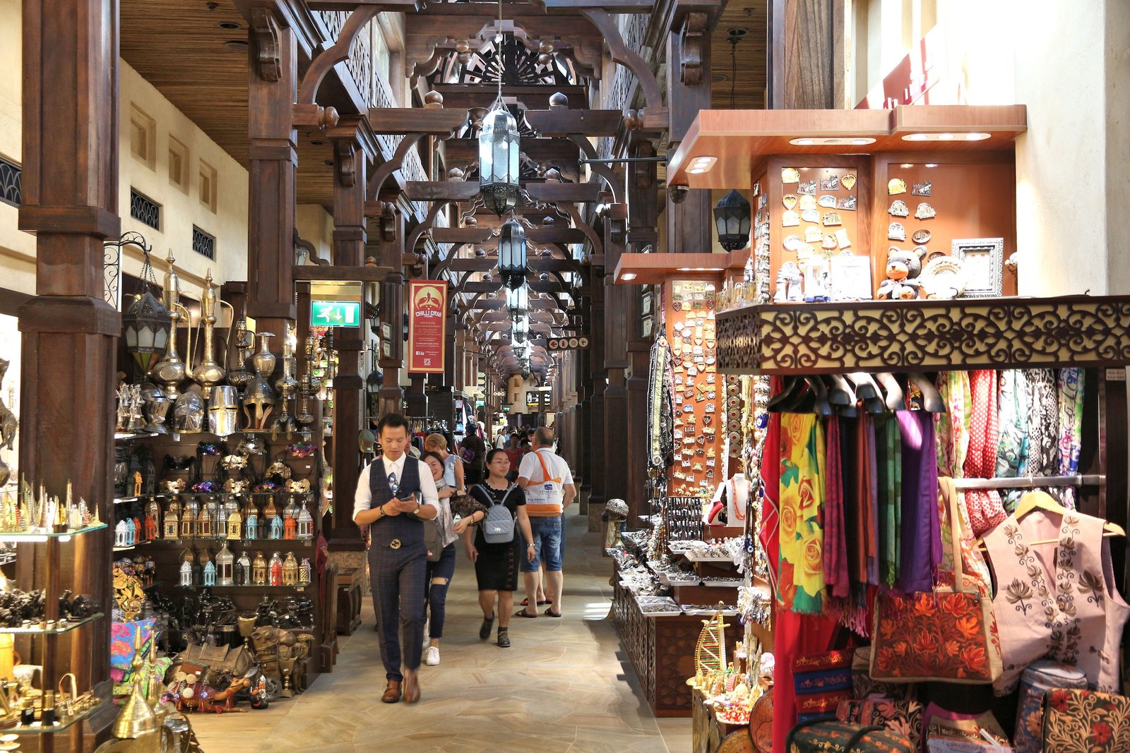 NOVEMBER 23, 2017: People shopping at Souk Madinat Jumeirah in Dubai. The traditional Arab style bazaar is part of Madinat Jumeirah resort.